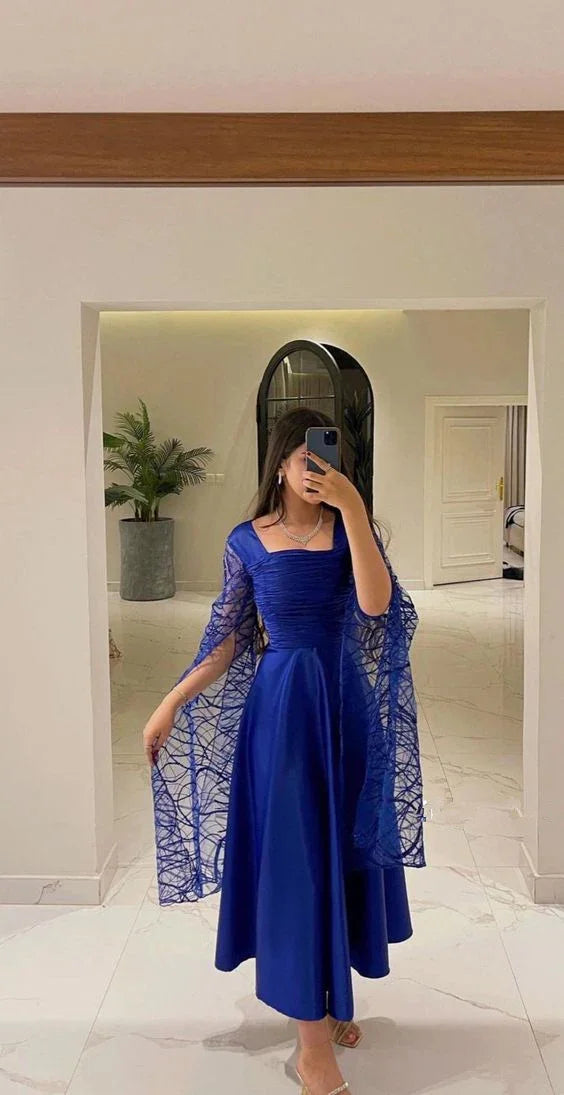 Woman in royal blue evening dress with lace shawl, elegant style from ZAPDRESS
