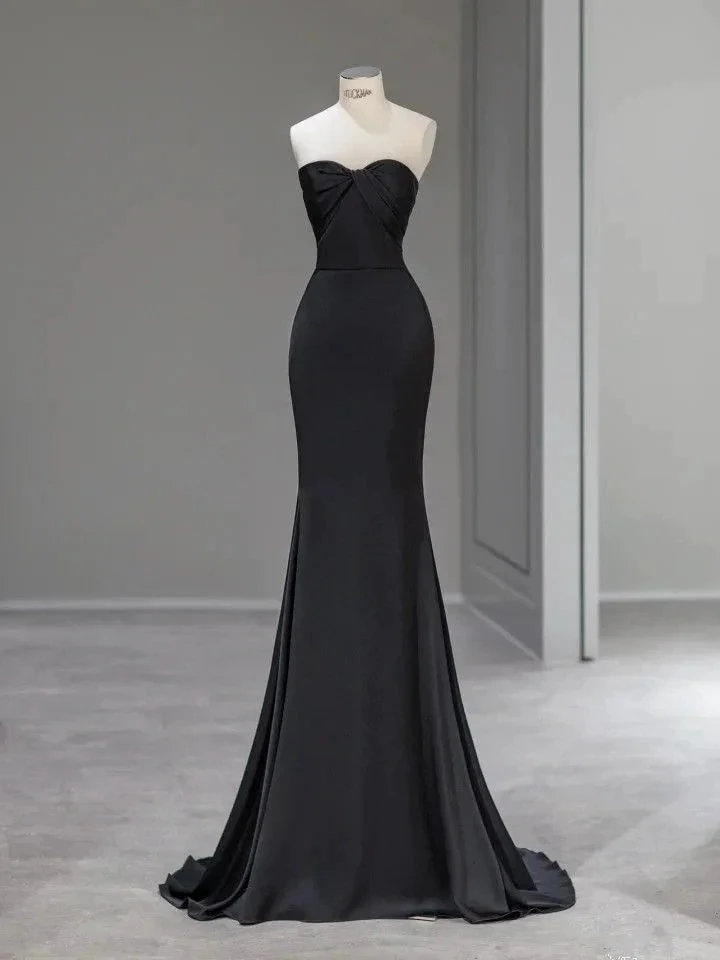 Elegant black strapless evening gown on mannequin in minimalist room, ZAPDRESS fashion