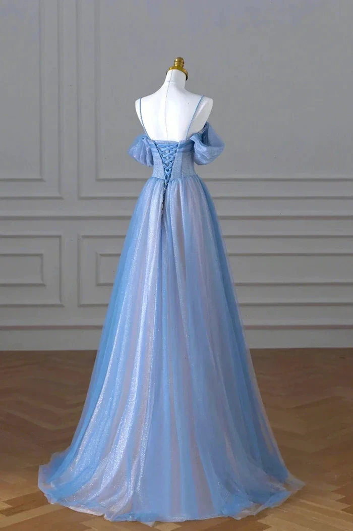 Elegant blue off-shoulder evening gown on mannequin, shimmering tulle, ZAPDRESS fashion