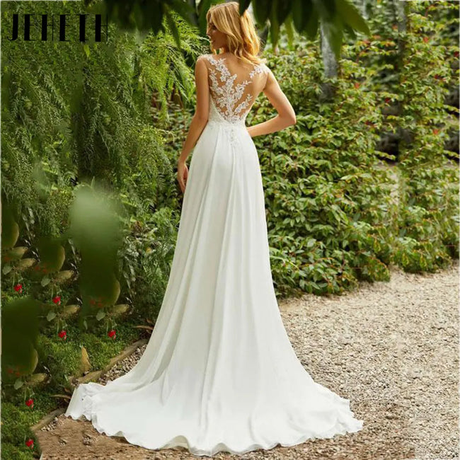 Beach Lace Chiffon Wedding Dress Charming O-Neck Appliques Bridal Gowns A-Line Backless Sleeveless Robe De Mariee 2024 Main Image