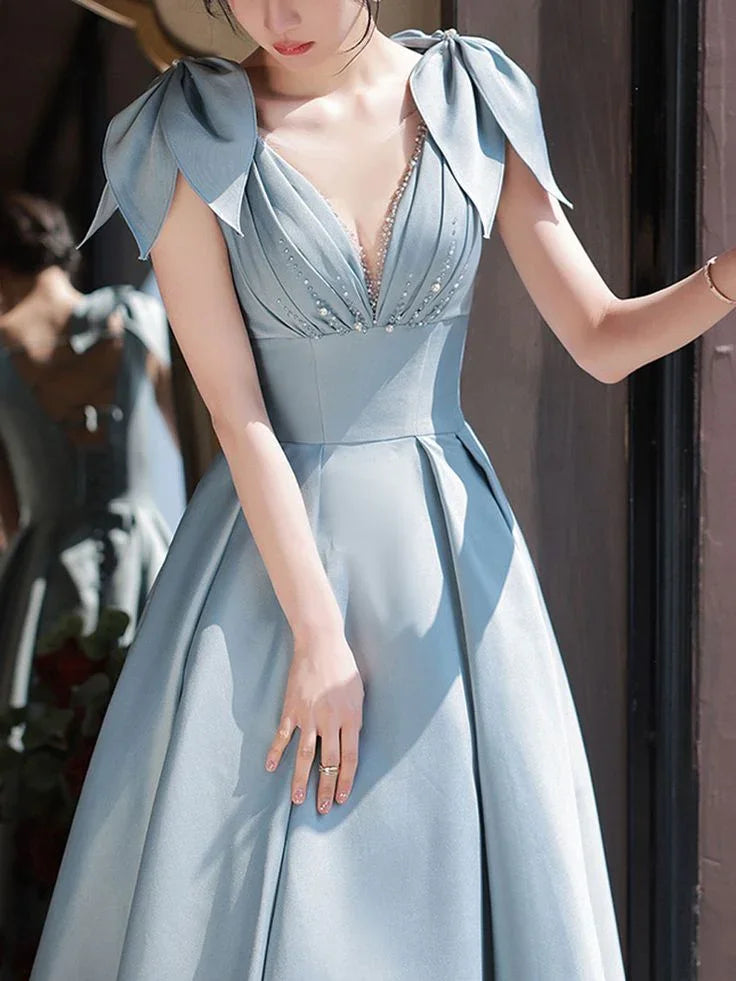 Elegant blue satin evening dress with bow shoulders and beaded V-neck, ZAPDRESS fashion