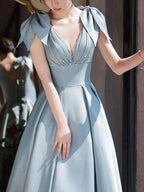 Elegant blue satin evening dress with bow shoulders and beaded V-neck, ZAPDRESS fashion