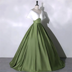 Elegant olive green ball gown with white off-shoulder top on mannequin, ZAPDRESS