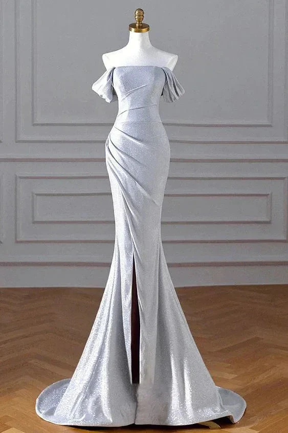 Elegant silver off-shoulder evening gown on mannequin in ZAPDRESS boutique setting