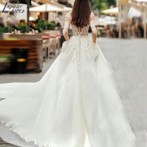 Graceful Wedding Dresses Bobo Illusion Long Sleeves Women Appliqued Lace Bridal Gowns Sexy Tulle فستان حفلات الزفاف