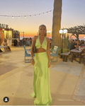 Woman in lime green halter maxi dress at sunset beach bar, ZAPDRESS fashion style