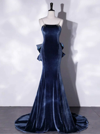 Elegant navy blue velvet evening gown with straps and ruffled sides on mannequin at ZAPDRESS