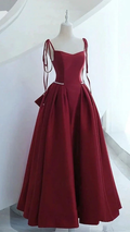 Elegant burgundy evening gown with pearl waist detail on mannequin, ZAPDRESS fashion
