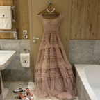 Elegant pink tiered tulle gown with pearls and matching heels in luxe bathroom, ZAPDRESS