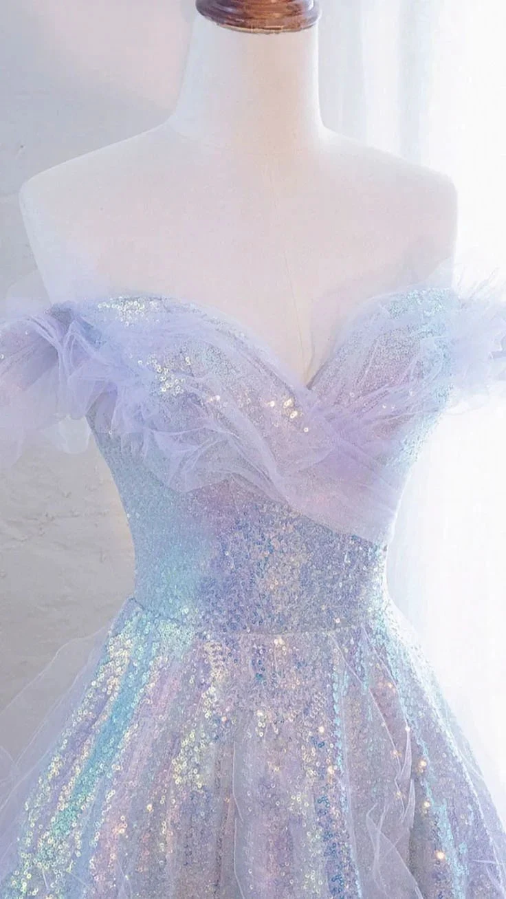 Iridescent off-shoulder sequin dress with tulle details displayed on mannequin at ZAPDRESS