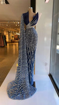 Elegant navy blue sequin evening dress on mannequin in ZAPDRESS boutique window display