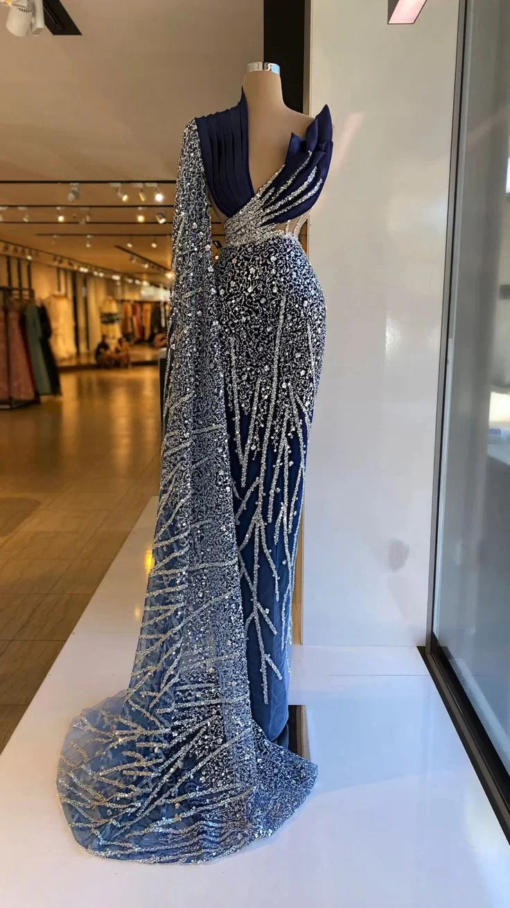 Elegant navy blue sequin evening dress on mannequin in ZAPDRESS boutique window display