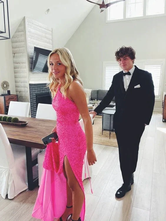 Woman in a sparkly pink evening dress and man in a tuxedo in a modern living room, ZAPDRESS style