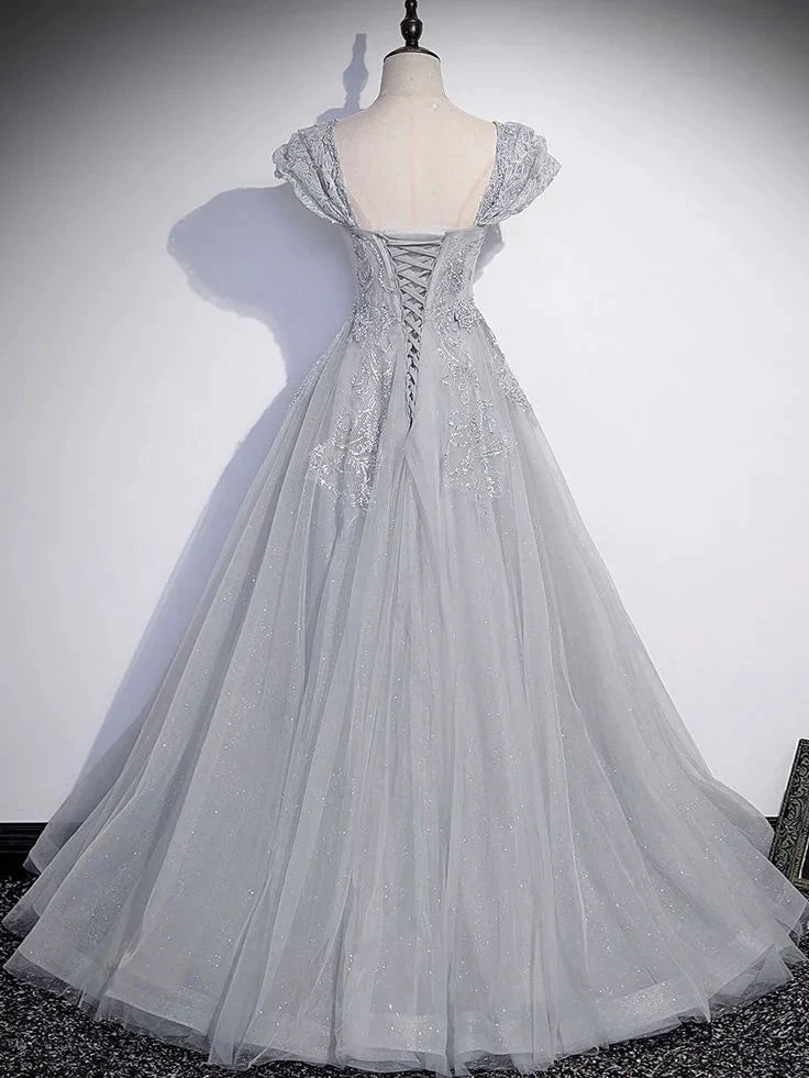 Elegant silver ball gown dress with lace-up back and sequin details on mannequin, ZAPDRESS