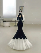 Elegant woman in black and white mermaid evening gown taking mirror selfie, ZAPDRESS fashion