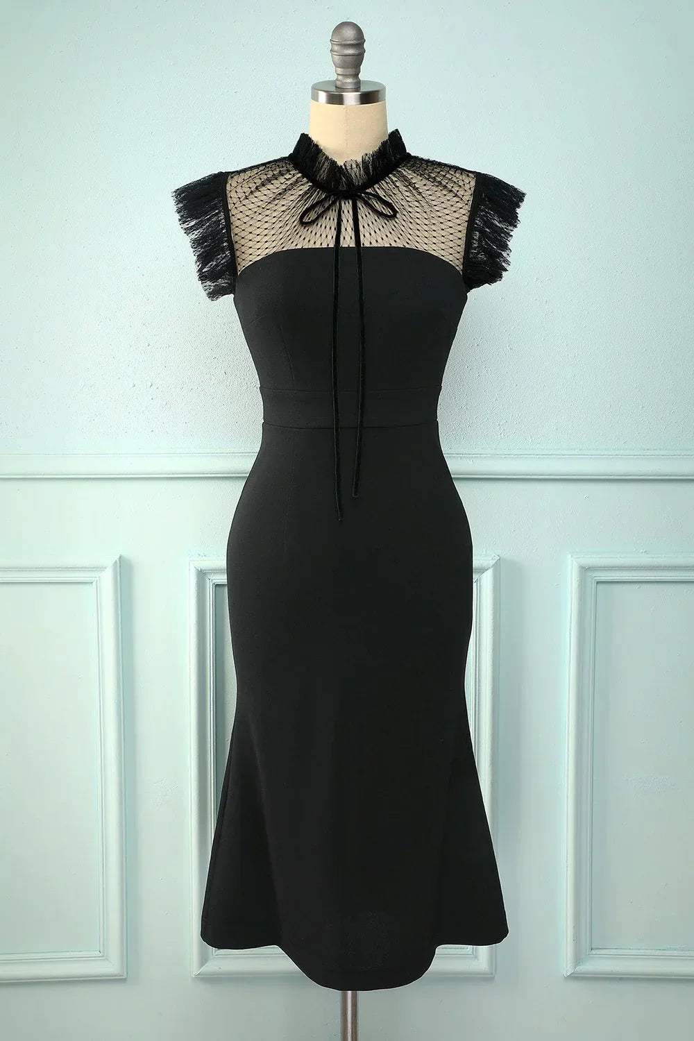 Elegant black cocktail dress with mesh neckline and fringe sleeves on mannequin, ZAPDRESS