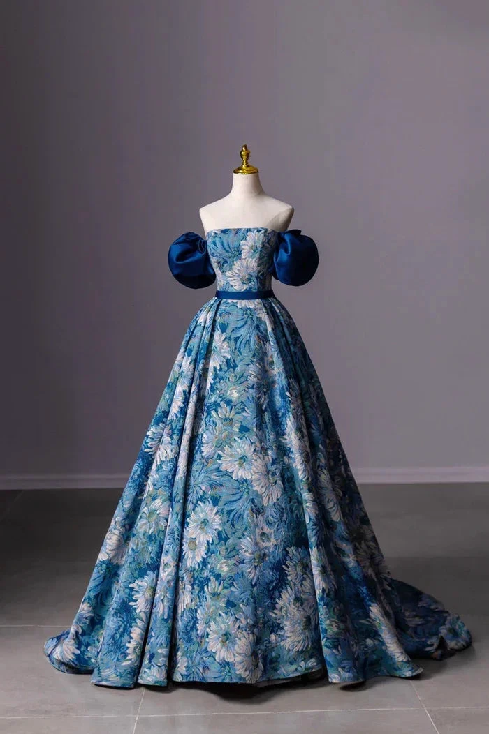 Elegant blue floral ball gown with puff sleeves displayed on mannequin, ZAPDRESS fashion