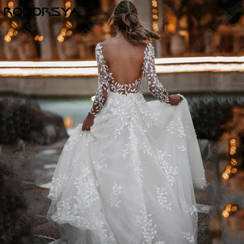 Sexy Backless Wedding Dresses New 2023 Long Sleeves Bride Gowns V-Neck A-Line Lace Applique Tulle vestidos de novia