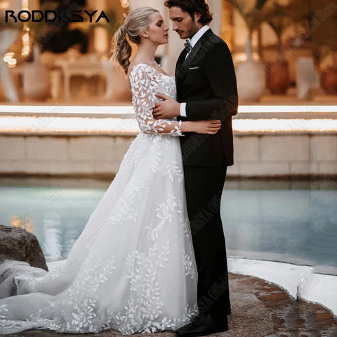 Sexy Backless Wedding Dresses New 2023 Long Sleeves Bride Gowns V-Neck A-Line Lace Applique Tulle vestidos de novia