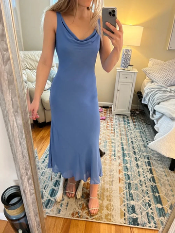 Woman in blue sleeveless midi dress taking mirror selfie in bedroom, ZAPDRESS fashion