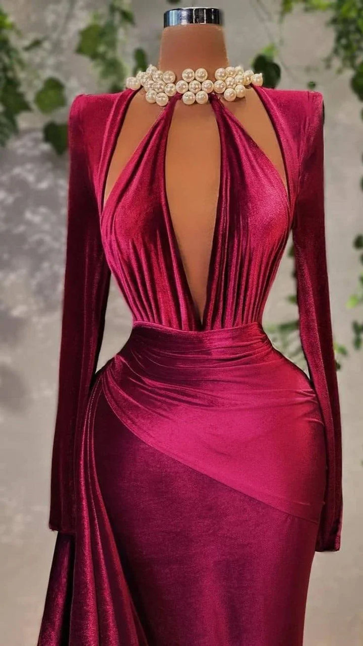 Elegant deep red velvet evening dress with long sleeves and pearl choker on mannequin at ZAPDRESS