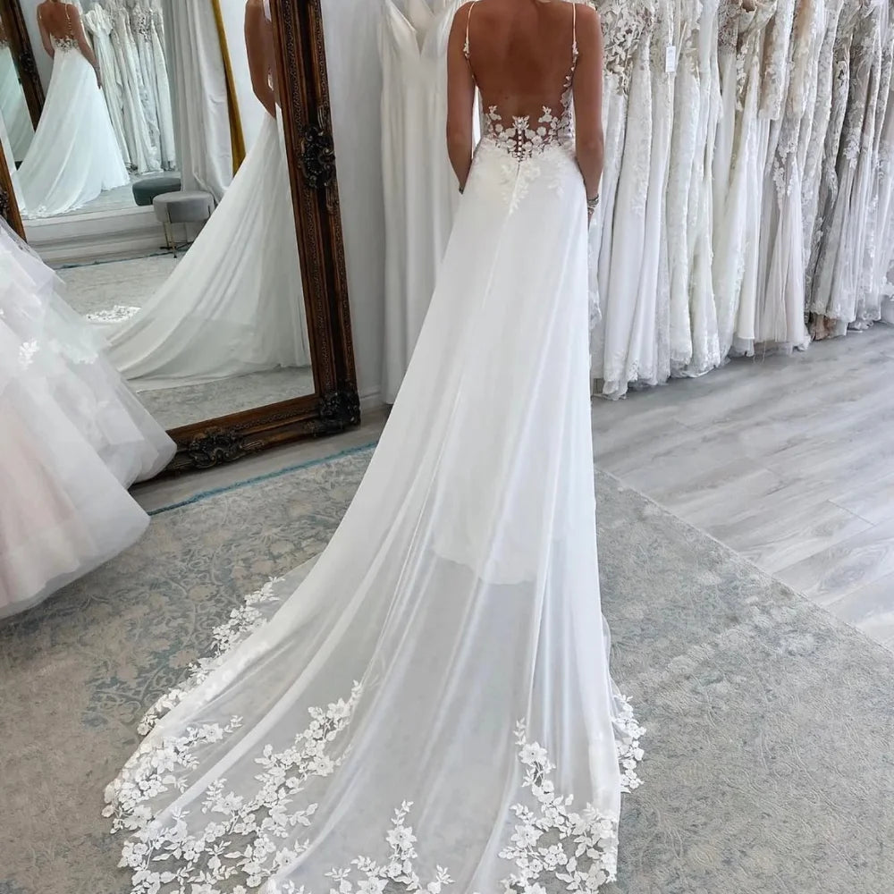 Beach Chiffon Wedding Dress Backless V-Neck Spaghetti Straps A-Line Bridal Gown with Lace Appliqués