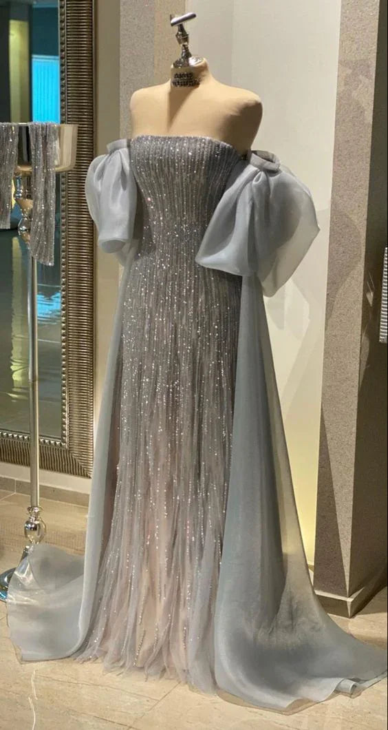 Elegant silver evening gown with off-shoulder puff sleeves on mannequin, ZAPDRESS fashion