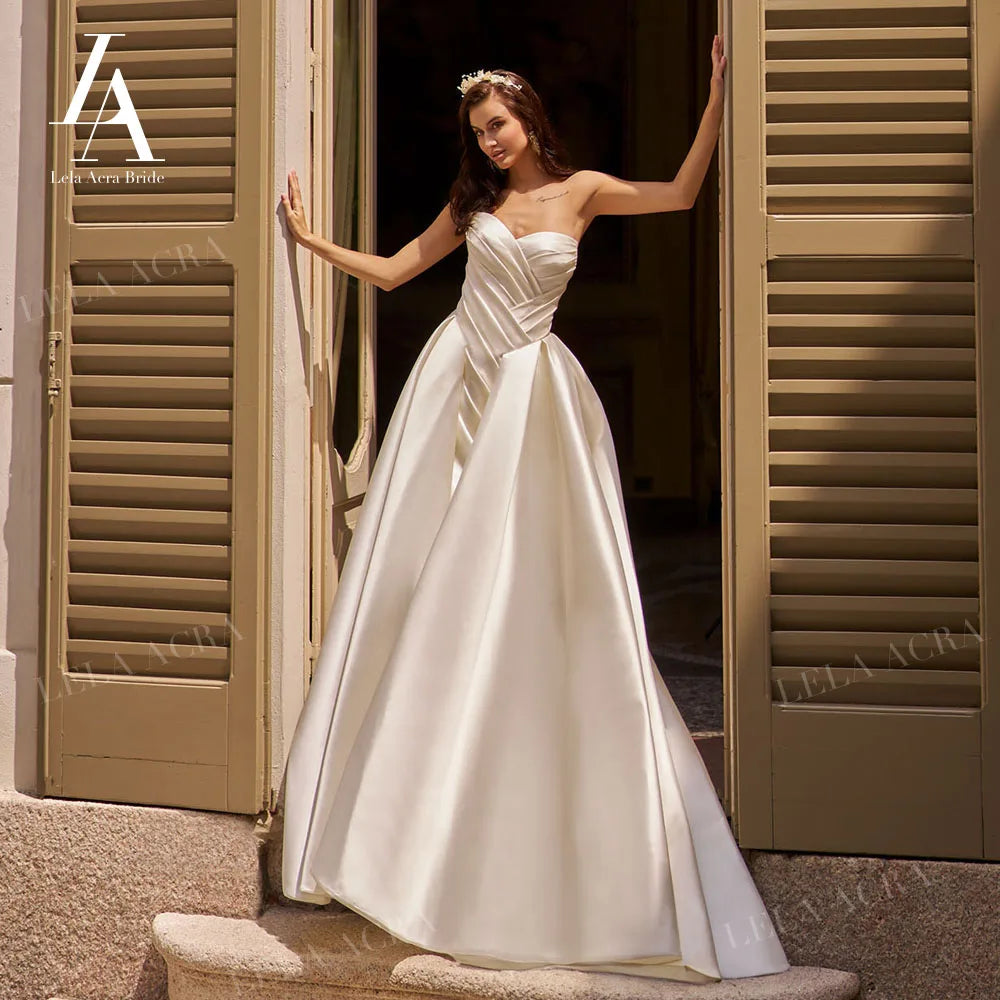 LelaAcra Sleeveless Satin A-Line Wedding Dress 2026 Sweetheart Backless Princess Bride Gown SM184 Plus Size Vestido De Noiva