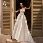 LelaAcra Sleeveless Satin A-Line Wedding Dress 2026 Sweetheart Backless Princess Bride Gown SM184 Plus Size Vestido De Noiva