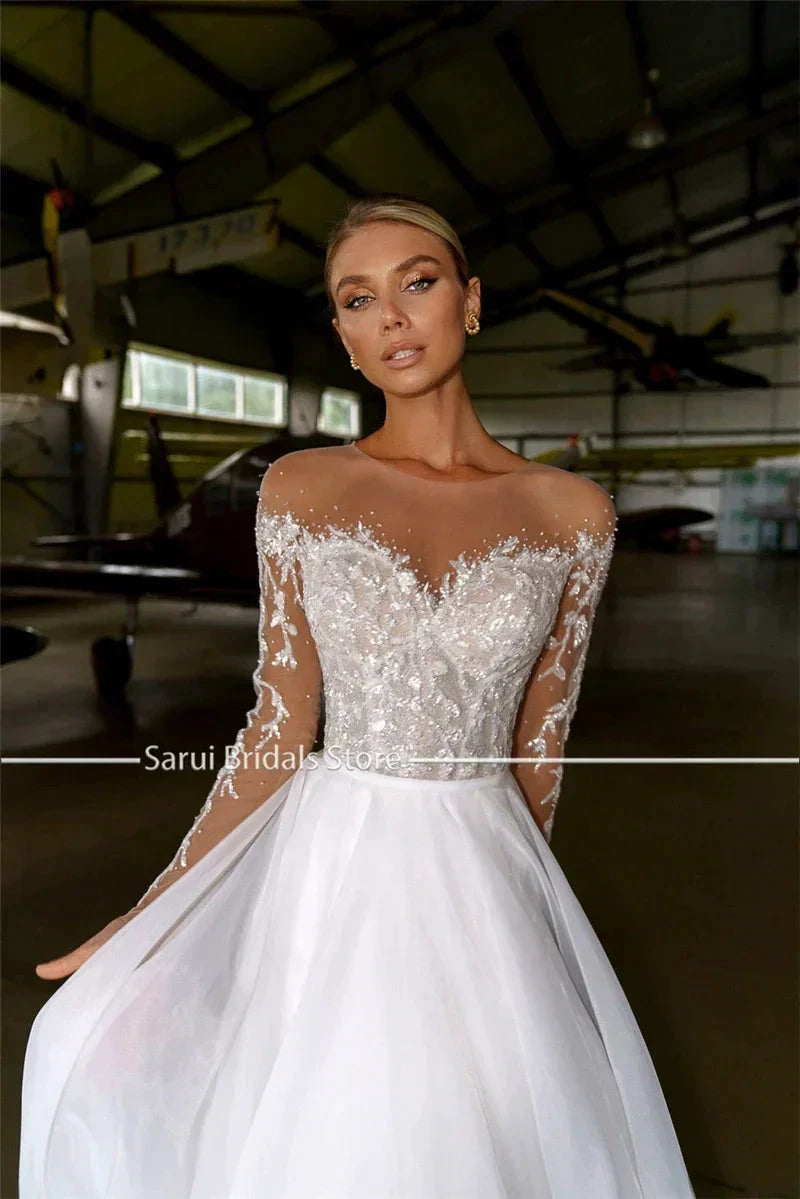 Sheer Neck with Heavy Crystals Long Sleeves White Wedding Dress Organza and Tulle A-line Bling Bridal Dress by payinti