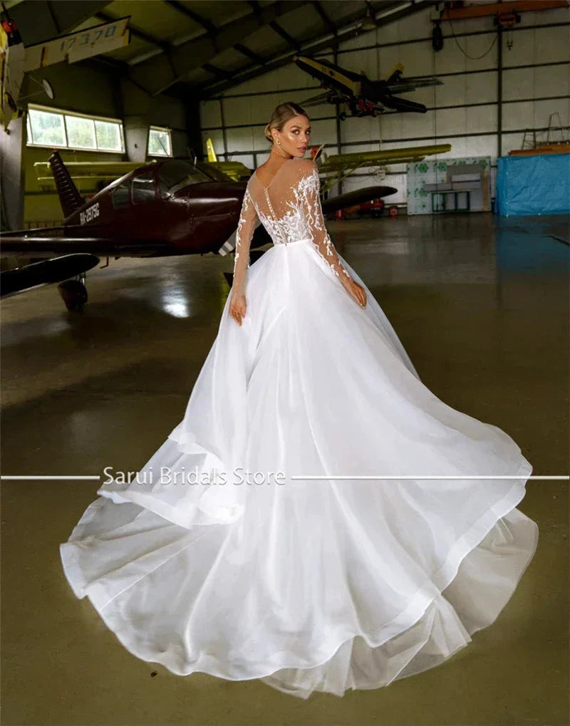 Sheer Neck with Heavy Crystals Long Sleeves White Wedding Dress Organza and Tulle A-line Bling Bridal Dress by payinti