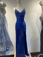 Sparkly blue sequin evening gown with slit on mannequin at ZAPDRESS store display