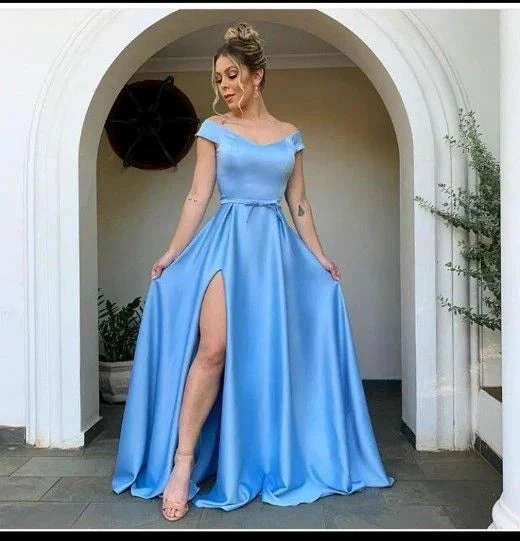 Woman in a light blue off-shoulder evening gown with high slit, ZAPDRESS fashion