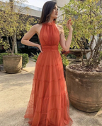 Woman in a sleeveless orange maxi dress outdoors, ZAPDRESS fashion style