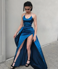 Woman in blue satin evening dress with high slit, outdoor, ZAPDRESS fashion.