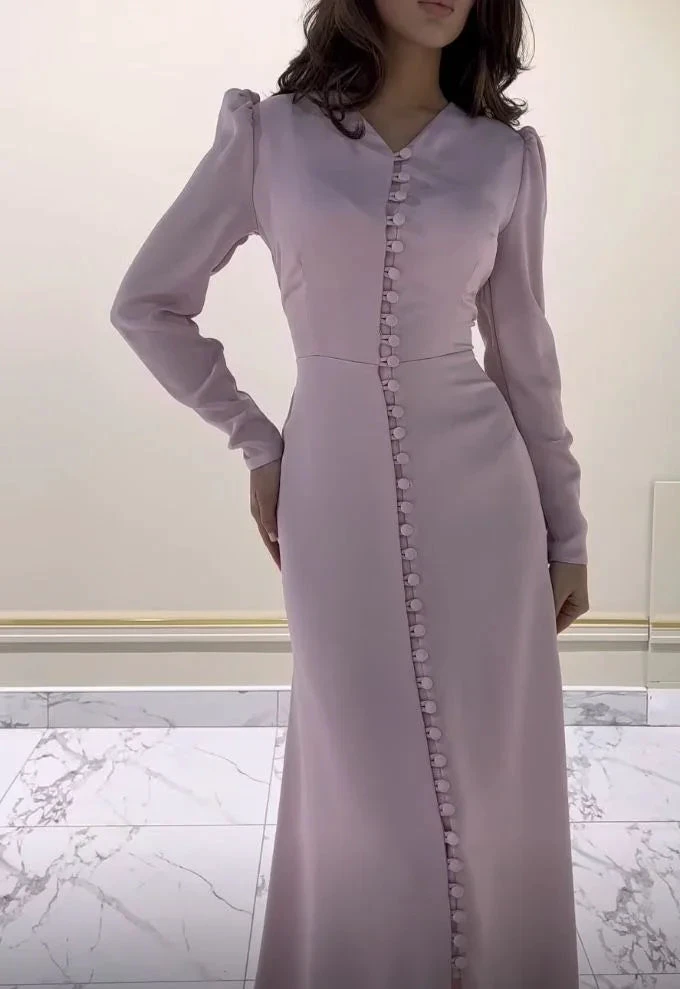 Woman modeling long-sleeve mauve dress with side buttons from ZAPDRESS