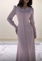 Woman modeling long-sleeve mauve dress with side buttons from ZAPDRESS