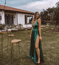 Woman in elegant green satin dress outdoors at event, ZAPDRESS fashion style
