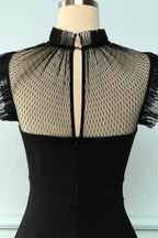 Back view of elegant black dress with sheer mesh polka dot overlay from ZAPDRESS