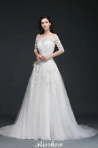 A-line Off-the-Shoulder Court Train Tulle Wedding Dresses with Buttons by misshow.com