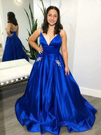A-line V Neck Satin Long Prom Dresses with Pockets Royal Blue Backless Formal Evening Gowns by BIZTUNNEL