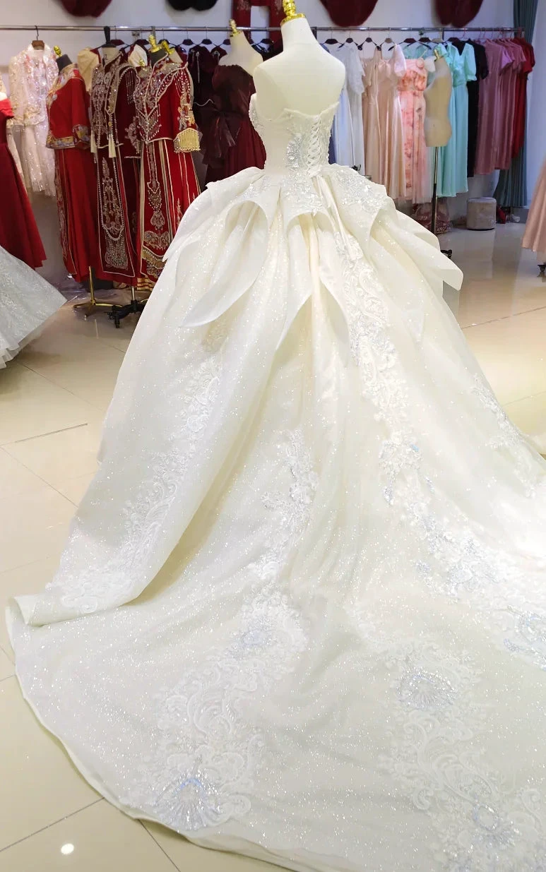 Ivory Glimmer Strapless Ballgown: Iridescent Beaded Bust & Flowing Train by ZAPDRESS