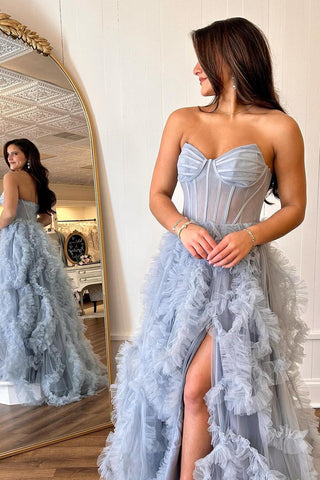 Blaues trägerloses A-Linien-Ballkleid mit Rüschen und Schlitz