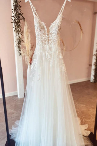 Wunderschönes langes rückenfreies A-Linien-Brautkleid aus Tüll mit Spitzenapplikationen