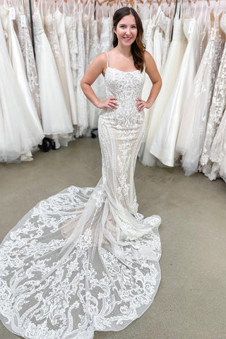 Wunderschönes langes Meerjungfrau-Brautkleid mit Spaghettiträgern und rückenfreiem Spitzenbesatz