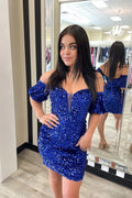 Hermoso vestido de fiesta azul real con hombros descubiertos y lentejuelas en la espalda