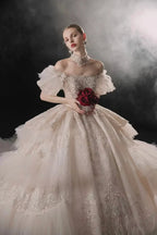 Opulent Off-the-Shoulder Ball Gown Tulle Puff Sleeve Beaded Lace Wedding Dress with Layered Ruffled Train & Choker Q6001 by ZAPDRESS