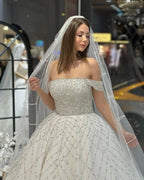 Charming Floor Length Off-The-Shoulder A-Line Sequined Wedding Dress with Court Train by misshow.com