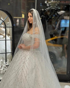 Charming Floor Length Off-The-Shoulder A-Line Sequined Wedding Dress with Court Train by misshow.com
