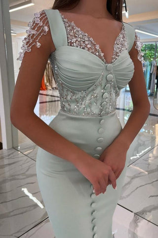 Elegante vestido de noche largo con tirantes verde menta, lentejuelas y abertura